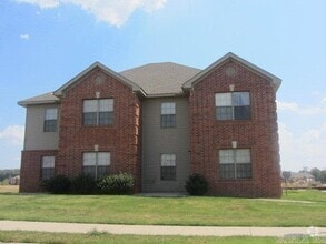 Building Photo - 10800 Frenchmen Loop Unit C