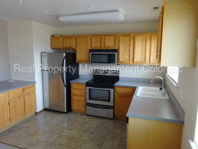 Building Photo - 8495 S REED ST #302