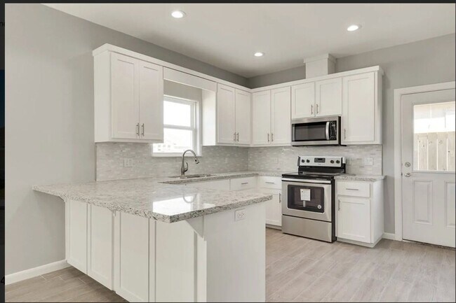 Foto del edificio - 410 Downing Ave