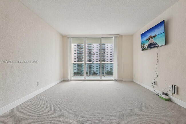 Building Photo - 19390 Collins Ave