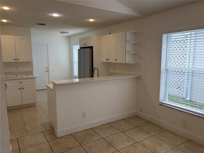 Building Photo - 9020 Lake Park Cir N