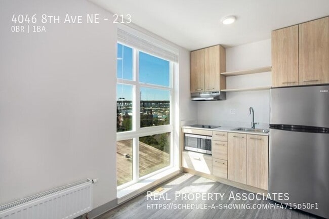 Building Photo - 4046 8th Ave NE