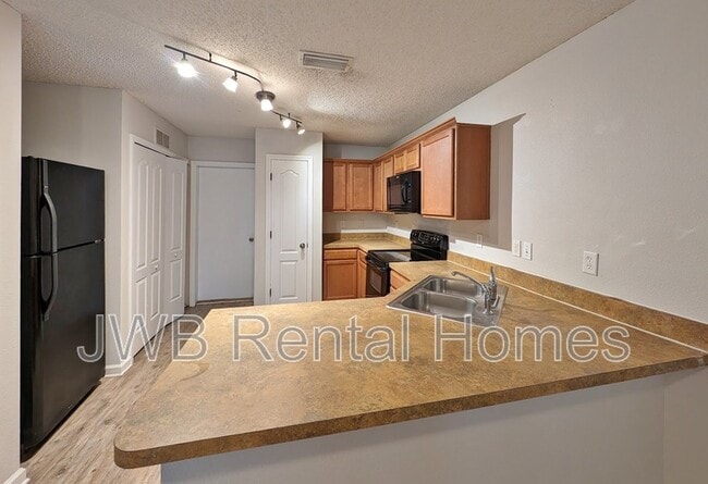 Building Photo - 4817 Playschool Dr