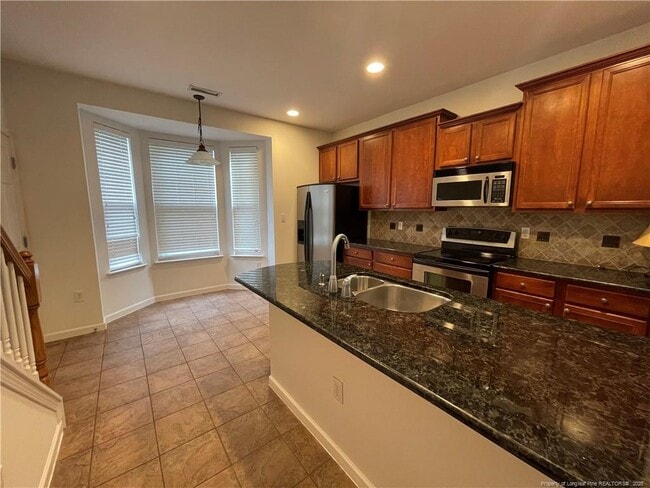 Building Photo - 8803 Camden Park Dr