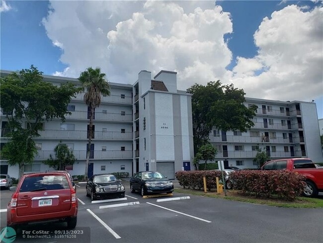 Building Photo - 8550 N Sherman Cir