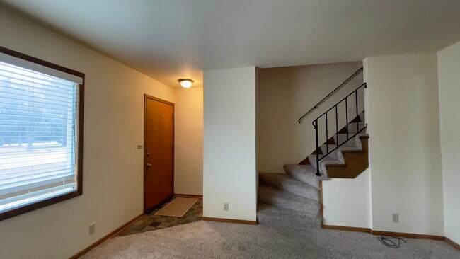 Living Room / Stairs - 1825 Oakdale Dr