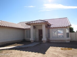 Building Photo - 8541 W Palm Ln
