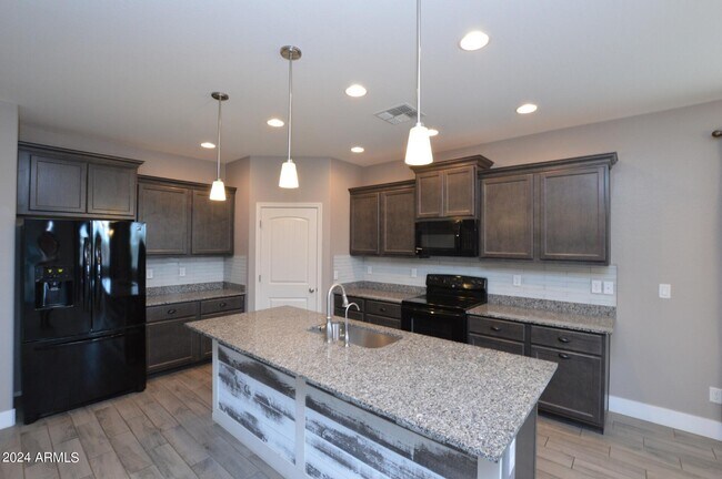 Building Photo - 37450 W Frascati Ave