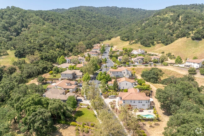Gilroy is surrounded by the mountains.