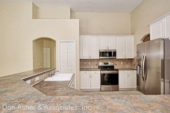 Building Photo - 4 br, 3 bath House - 13566 Banana Bay Dr.