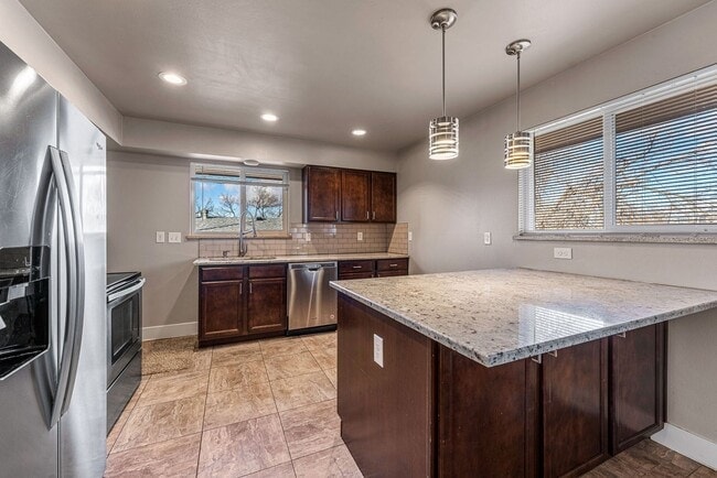 Photo - 5417 S Fox St Townhome