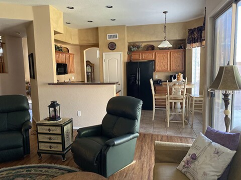 Family room to kitchen - 7446 E Odessa Cir
