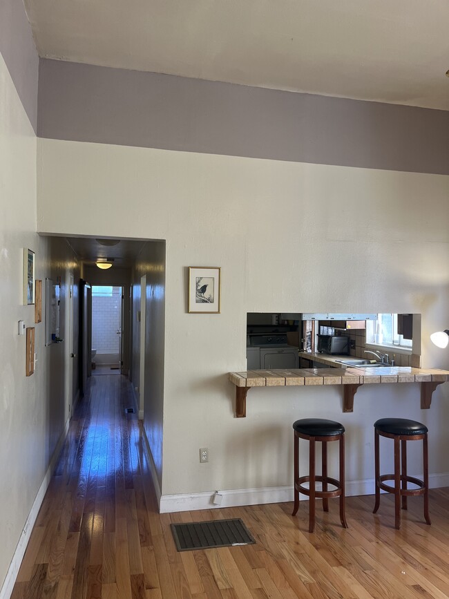 View of Kitchen Bar from Living Room - 1077 12th St