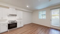 This 470 square foot apartment in San Diego offers a thoughtful blend of comfort and efficiency. The single-story layout comprises two bedrooms, including a primary bedroom of 110 square feet, and one bathroom. The modern kitchen is a highlight, featuring sleek white cabinetry, stainless steel appliances, and a functional L-shaped design. Wood-look flooring runs throughout the space, creating a cohesive and contemporary aesthetic.

The bathroom showcases a clean, white design with a vanity sink and modern fixtures. Both bedrooms offer ample space and include built-in closets for storage. Large windows in the bedrooms allow natural light to flood the spaces, creating a bright and airy atmosphere.

The apartment's compact size is maximized through its efficient layout, making it an ideal choice for those seeking a low-maintenance living space. Its location in the 92117 zip code of San Diego ensures residents are well-positioned to enjoy the city's amenities. This property represents a perfect balance of modern comfort and urban convenience in a sought-after California locale.