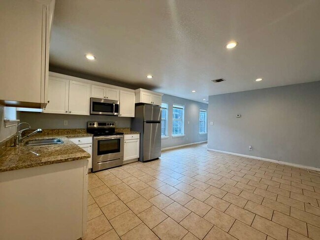 Foto del edificio - 3107 W Travis St