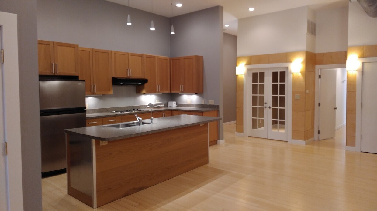 KITCHEN AREA - large island and stainless appliances including dishwashwer - 100 W Market St