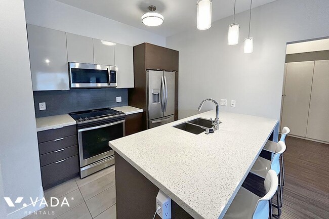 Building Photo - Sequel 1 Bed Apartment Rental 206-7727 Roy...