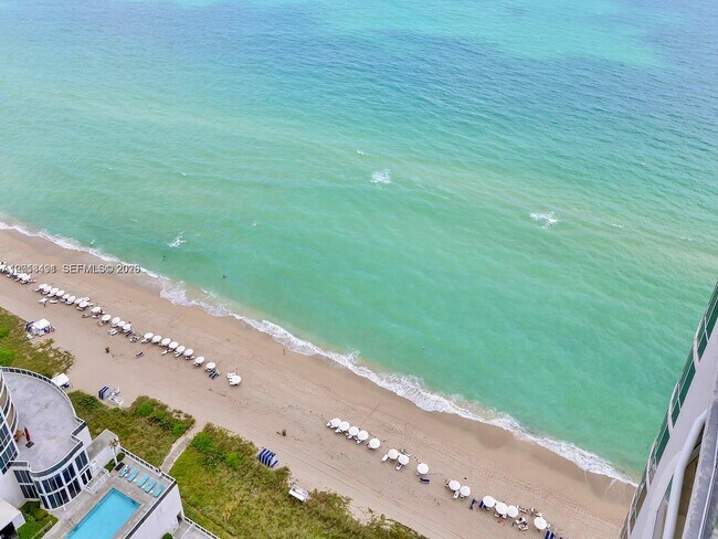 Building Photo - 15811 Collins Ave