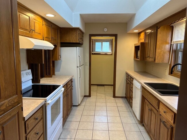 Building Photo - PRICE ADJUSTMENT! Lakewood Village Duplex