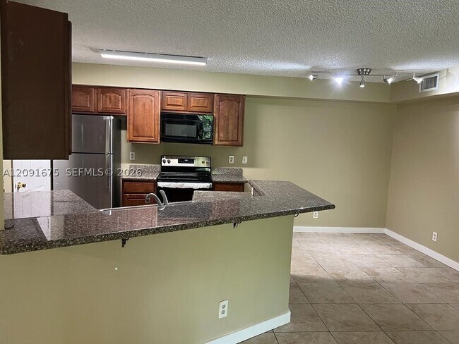 Building Photo - 9999 Summerbreeze Dr