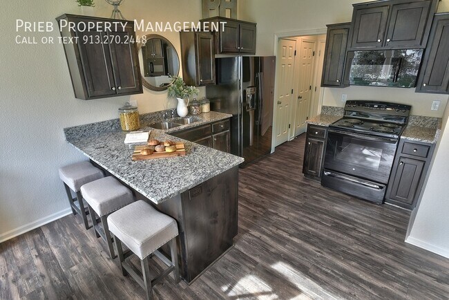 Building Photo - Reserve Townhome - Available June 23rd