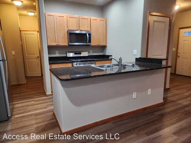 Building Photo - 4 br, 2.5 bath House - 6216 Malloy Ave