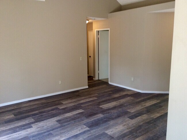 Living room to hall accessing bedrooms - 5716 Terrace Dr