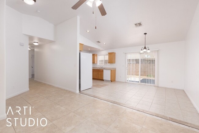 Building Photo - 3-bedroom 2-bathroom townhouse with a 1-ca...