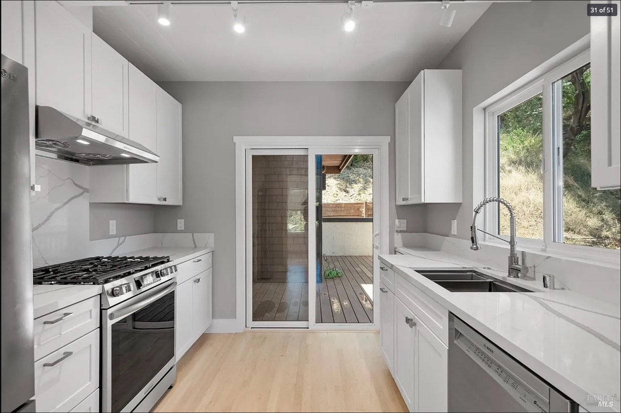 Brand new kitchen with new high end appliances including Bosch dishwasher. Kitchen opens onto deck. - 300 Miller Ave