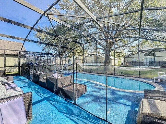 Building Photo - STUNNING Emerald Island Resort 5 bedroom 4...