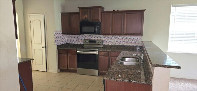 Foto del edificio - 4903 Jagged Cliff Ln