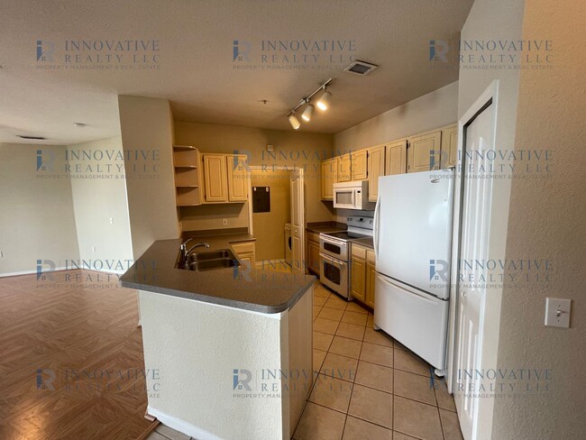Building Photo - 2BR/2BA First Floor Condo in Visconti in M...
