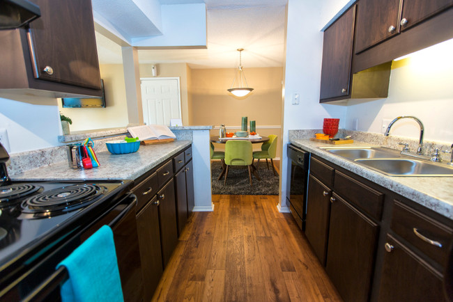 Upgraded Kitchen with Walnut Cabinets - The Retreat at Rocky Ridge