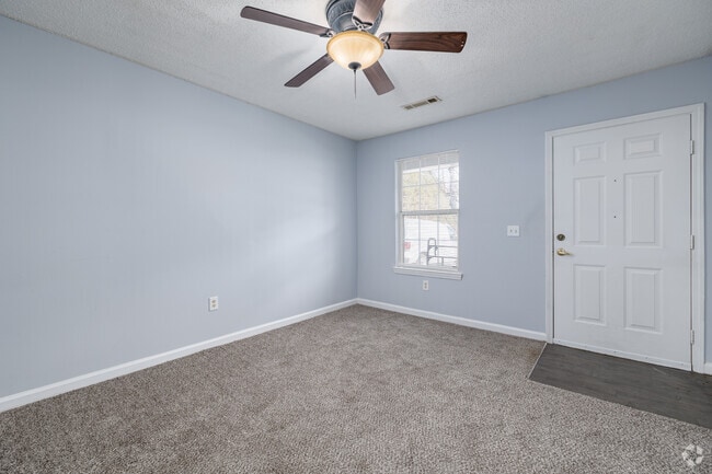 1BR, 1BA - 650SF - Living Room - Eagles Nest Apartments 62+ Community
