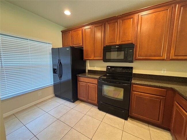 Foto del edificio - 8515 Trail Wind Dr