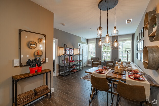 1BR, 1.5BA w/Den - 890SF - The Amsterdam II - Dining Room - Station Village at Avenel