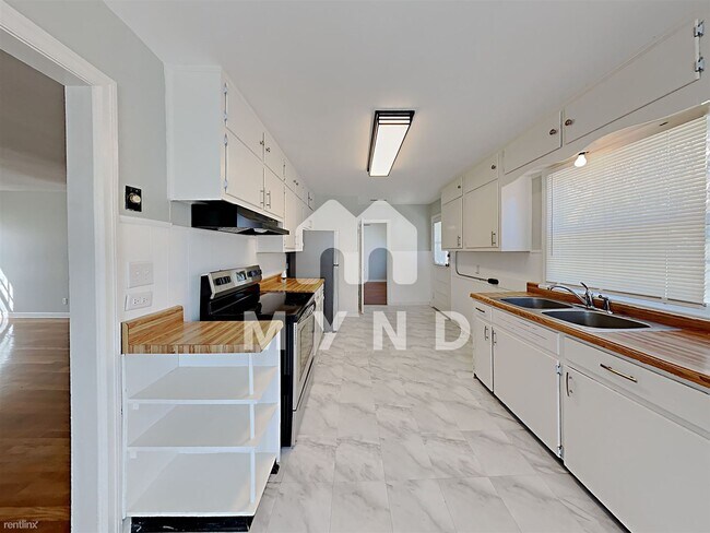 Building Photo - 2 br, 1 bath House - 9032 Beverly Dr N