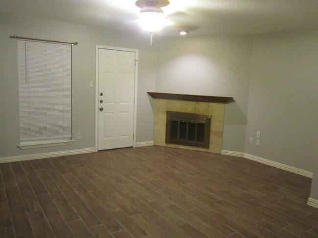 living and fireplace - 239 W Peach St