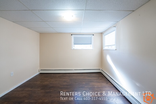 Building Photo - Conveniently Located and Pet Friendly Basement Suite with Yard Space