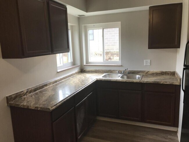 Building Photo - 4145 Ridge Road Unit #02
