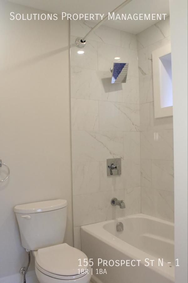 Building Photo - **Bright and Open 1 Bedroom Main Floor Unit**