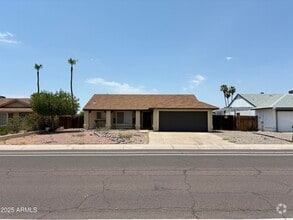 Building Photo - 11014 N 65th Ave