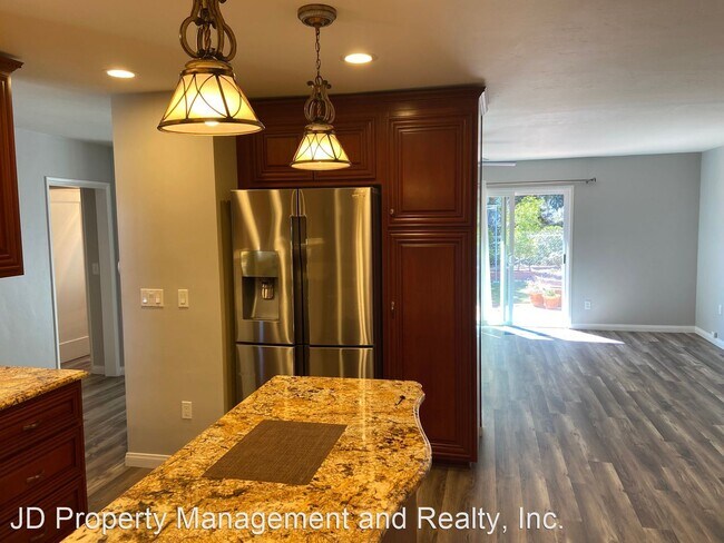 Foto del edificio - 4 br, 2 bath House - 8671 Chantilly Ave