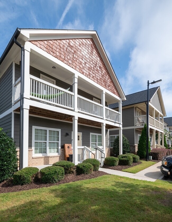The-Collective-at-Kennesaw-Apartments-Near-KSU-Building-Exterior-Cottage-with-Front-Porch-and-2nd-Story-Balcony - The Collective at Kennesaw Apartments