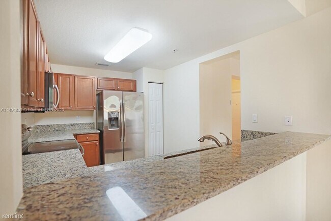 Building Photo - 3 br, 2 bath House - 8620 NW 97th Ave Apt 102