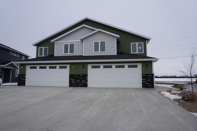 Large driveway and two stall extra large garage (Photos are of similar unit with similar finishes.) - 3811 Stacy Drive