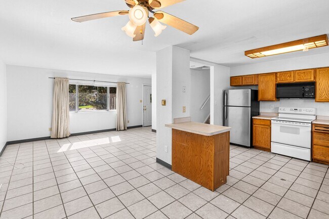 Building Photo - Tri-level Home with Spacious Backyard near...