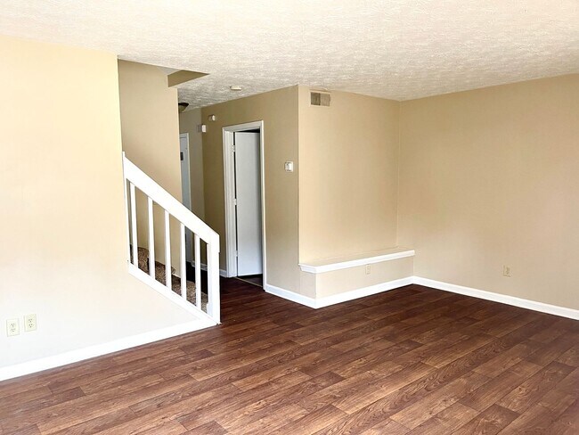 Building Photo - Welcome to COZY Townhome in Fayetteville, ...