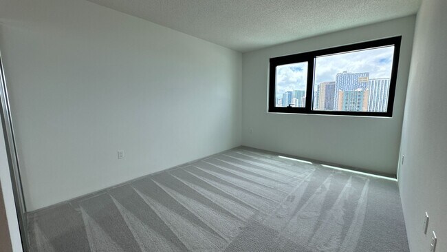 Foto del edificio - Epitome of modern urban living in the vibrant heart of Kaka'ako 2 Bed 2 Bath 2 PK
