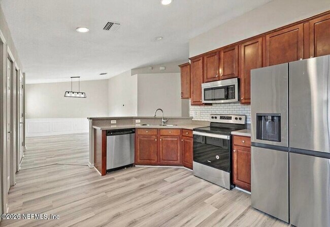 Foto del edificio - 6607 White Blossom Ct